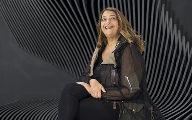 Bri0041097. Telegraph. Architect and designer Zaha Hadid poses in front of pieces of her own work in East London Friday July 06, 2012. Picture by Christopher Pledger